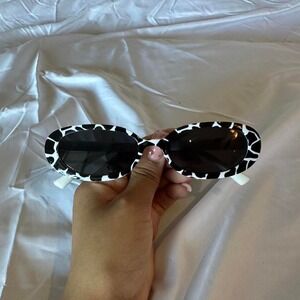 black and white cow print sunglasses
